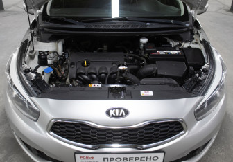 Подержанный автомобиль Kia Ceed Hatchback 2013 года (9 фото)