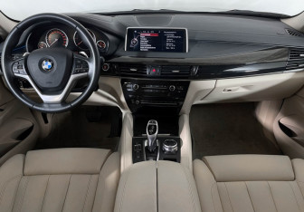 Подержанный автомобиль BMW X6 2015 года (11 фото)