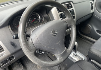 Подержанный автомобиль Suzuki Liana Wagon 2005 года (14 фото)