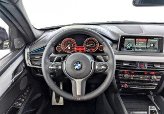 Подержанный автомобиль BMW X6 2018 года (22 фото)