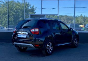 Подержанный автомобиль Nissan Terrano 2016 года (5 фото)
