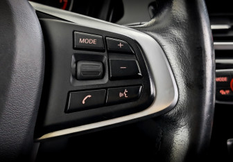 Подержанный автомобиль BMW X1 2017 года (29 фото)