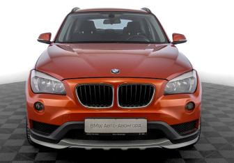Подержанный автомобиль BMW X1 2014 года (2 фото)