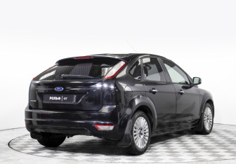 Подержанный автомобиль Ford Focus Hatchback 2011 года (14 фото)