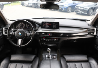 Подержанный автомобиль BMW X5 2014 года (12 фото)