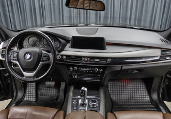 Подержанный автомобиль BMW X5 2014 года (14 фото)