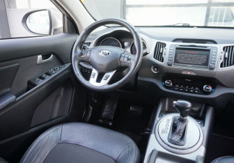 Подержанный автомобиль Kia Sportage 2014 года (13 фото)