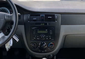 Подержанный автомобиль Daewoo Gentra Sedan 2014 года (13 фото)