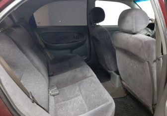 Подержанный автомобиль Kia Spectra Sedan 2007 года (18 фото)