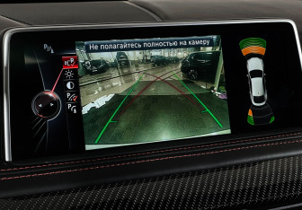 Подержанный автомобиль BMW X6 M 2015 года (19 фото)