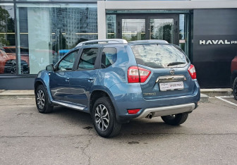 Подержанный автомобиль Nissan Terrano 2014 года (7 фото)