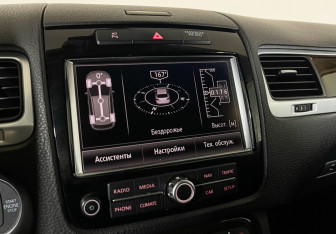 Подержанный автомобиль Volkswagen Touareg 2014 года (16 фото)