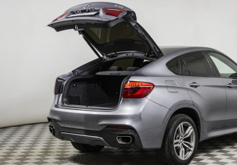 Подержанный автомобиль BMW X6 2018 года (21 фото)