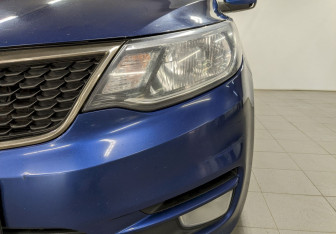Подержанный автомобиль Kia Rio Sedan 2015 года (16 фото)