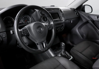 Подержанный автомобиль Volkswagen Tiguan 2016 года (14 фото)