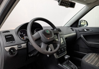 Подержанный автомобиль Skoda Yeti 2012 года (15 фото)