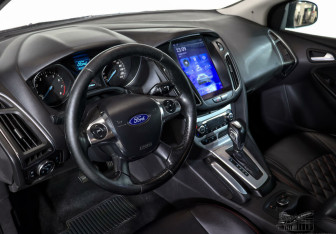 Подержанный автомобиль Ford Focus Hatchback 2013 года (7 фото)