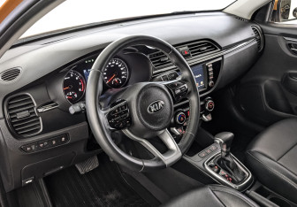 Подержанный автомобиль Kia Rio Sedan 2017 года (15 фото)