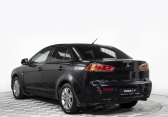 Подержанный автомобиль Mitsubishi Lancer Sedan 2008 года (7 фото)