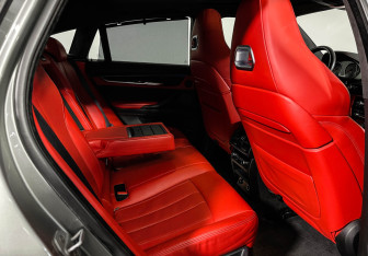 Подержанный автомобиль BMW X6 M 2015 года (12 фото)
