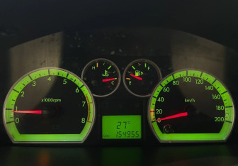 Подержанный автомобиль Chevrolet Aveo Sedan 2006 года (15 фото)
