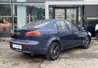 Подержанный автомобиль Mitsubishi Lancer Sedan 2008 года (5 фото)