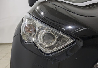 Подержанный автомобиль Infiniti QX70 2014 года (11 фото)