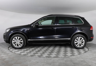 Подержанный автомобиль Volkswagen Touareg 2014 года (8 фото)
