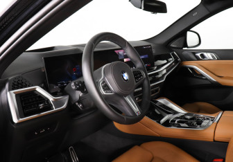 Подержанный автомобиль BMW X6 2024 года (12 фото)
