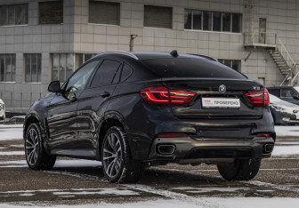 Подержанный автомобиль BMW X6 2018 года (7 фото)