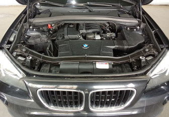 Подержанный автомобиль BMW X1 2013 года (14 фото)