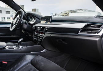 Подержанный автомобиль BMW X6 2018 года (15 фото)