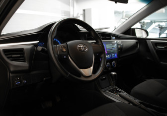 Подержанный автомобиль Toyota Corolla Sedan 2014 года (7 фото)