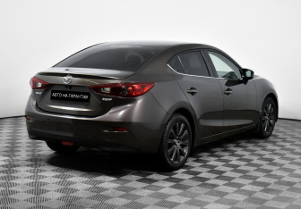Подержанный автомобиль Mazda 3 Sedan 2014 года (5 фото)