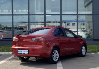 Подержанный автомобиль Mitsubishi Lancer Sedan 2012 года (5 фото)