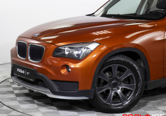 Подержанный автомобиль BMW X1 2014 года (18 фото)