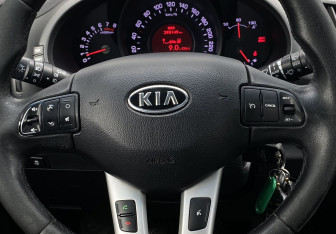 Подержанный автомобиль Kia Sportage 2011 года (15 фото)