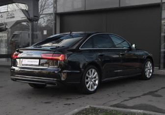 Подержанный автомобиль Audi A6 Sedan 2015 года (5 фото)