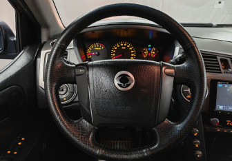 Подержанный автомобиль SsangYong Kyron 2012 года (12 фото)