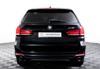 Подержанный автомобиль BMW X5 2014 года (6 фото)