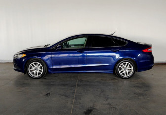 Подержанный автомобиль Ford Fusion (North America) 2015 года (7 фото)