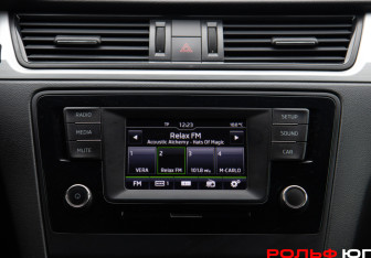 Подержанный автомобиль Skoda Rapid Liftback 2016 года (14 фото)