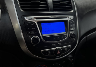 Подержанный автомобиль Hyundai Solaris Sedan 2013 года (10 фото)