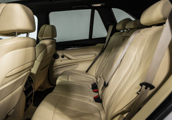 Подержанный автомобиль BMW X5 2014 года (14 фото)