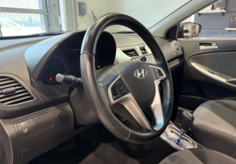 Подержанный автомобиль Hyundai Solaris Sedan 2013 года (13 фото)