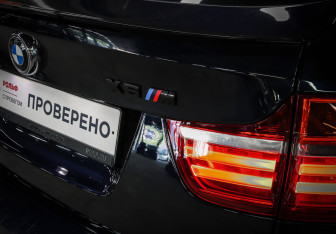 Подержанный автомобиль BMW X6 M 2013 года (30 фото)