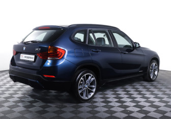 Подержанный автомобиль BMW X1 2012 года (5 фото)
