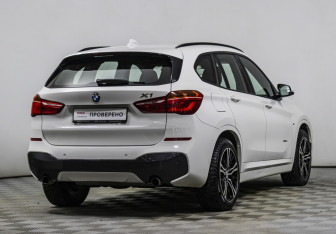 Подержанный автомобиль BMW X1 2015 года (5 фото)