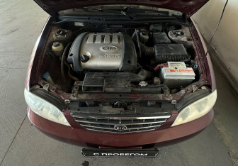 Подержанный автомобиль Kia Spectra Sedan 2006 года (15 фото)