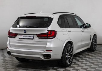 Подержанный автомобиль BMW X5 2014 года (5 фото)
